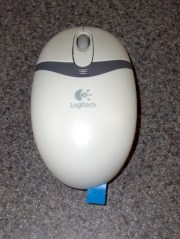 Mouse with battery disconnected and tabbed