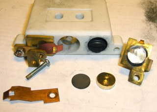 Rheostat with brass spacer button