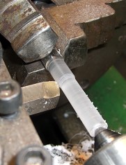 Turning central contact post