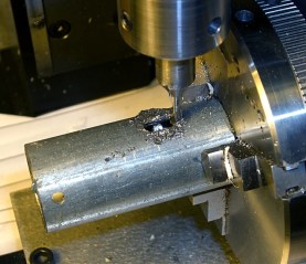 Milling rotation stop slot in shell