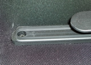 Ramp on front edge of lower clamp rail