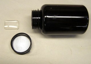 Raw material: rectangular lens and opaque bottle