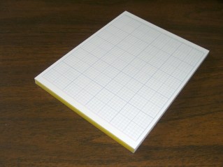 Quarter-sheet grid tablet - showing binding