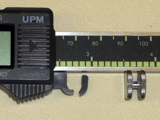 Broken caliper thumb roller mount