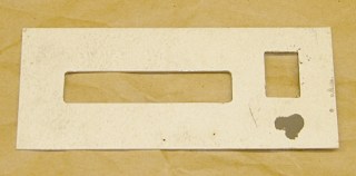 Epoxy-patched front panel hole