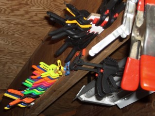 Clamp storage plates on floor joist