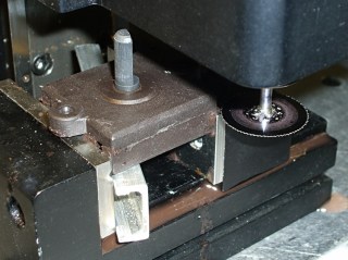 Opening switch with slitting saw