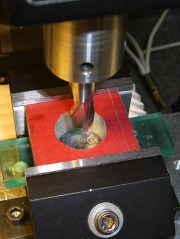 Helix-milling the clamp hole