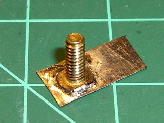 Tin strip soldered in place