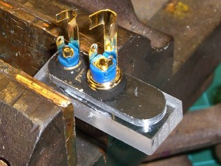 Plugs epoxied into plate