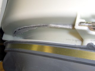 Outer Tub Damage - Top Left