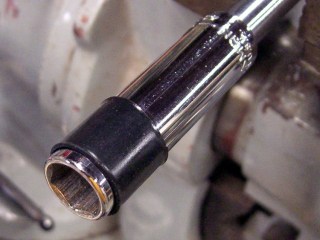 Shrinking tubing on a mandrel