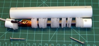 Cushioned ferrite bar antenna