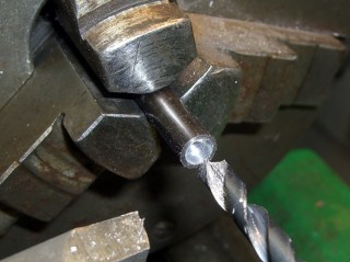 Drilling central recess