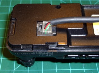 Connector with displaced insulation