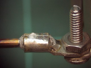 Crimped and soldered lug