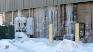 Ice flow across wall