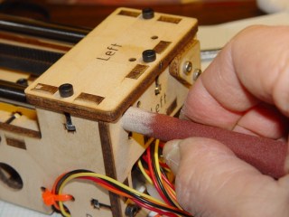 Adjusting rod hole position