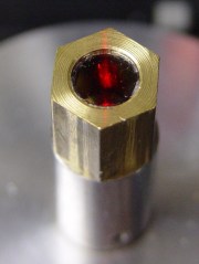 Polarizing film in upper bushing