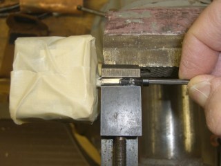 Flatted shaft with screw