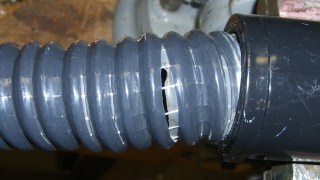 Splitting vacuum hose