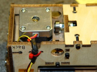 X Axis motor wire strain relief
