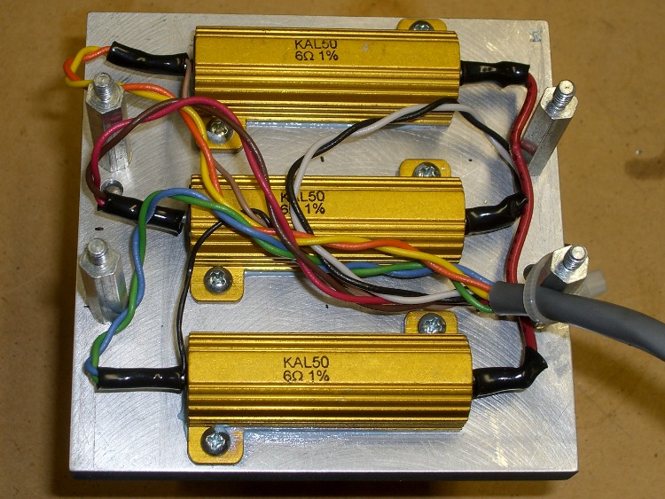 Power resistors on heat spreader