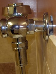 Plumbing trim plate vs tiled wall