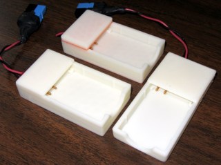 Variations on an NB-5L holder theme