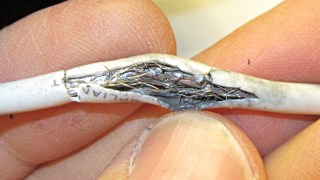 Fatigue-failed helmet cable