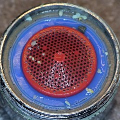 Bath faucet nozzle grit