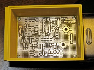 Bare PCB in Wouxun HT battery case