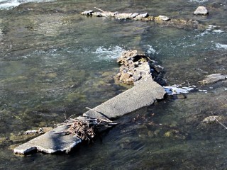 Red Oaks Mill dam - displaced concrete