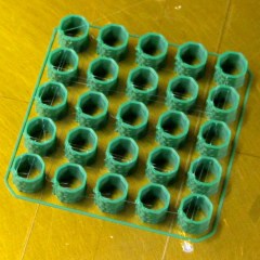 Pin cap array on build platform