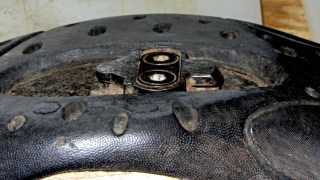 Worn SPD cleat in cycling shoe