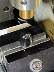 Laser aligning to knob feature