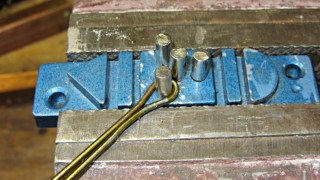 Screwdriver clip - screw bend