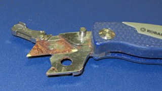 Corroded mini utility knife blade