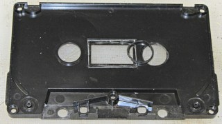 Cassette tape case - detached bushing