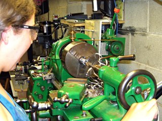Karen at the lathe