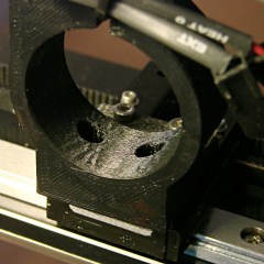 M2 extruder - motor mount clamp - plastic ripples
