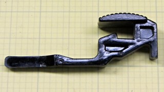 Stapler latch - broken spring tab