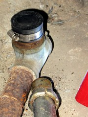 Sealed sink drain pipe with split nut