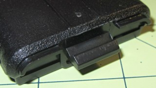 Baofeng UV-5RE radio - battery latch tab