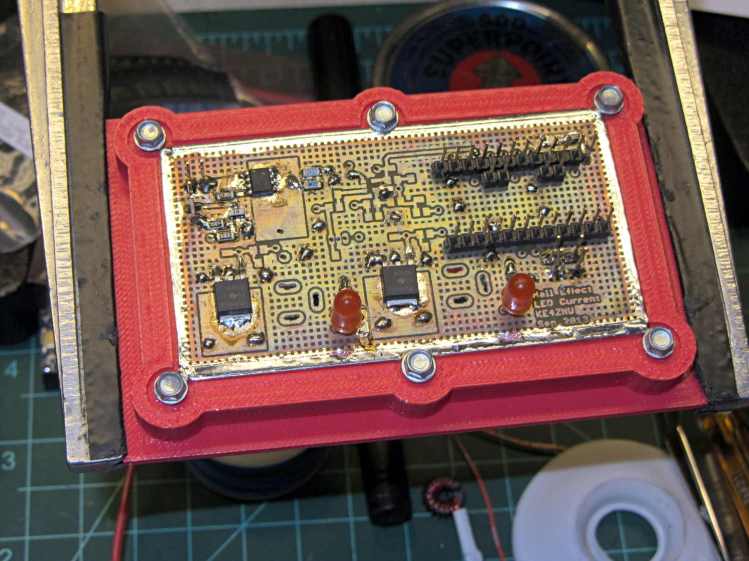 PCB stiffener in board holder