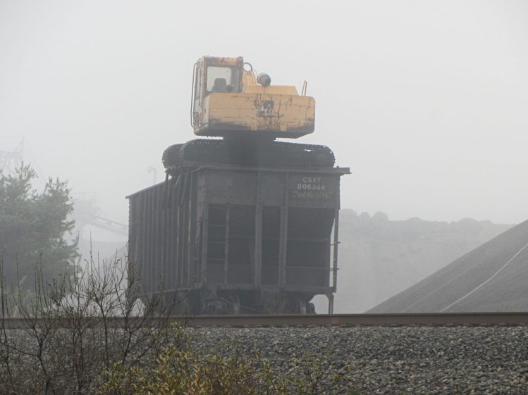 Excavator on CSX gondola car - end