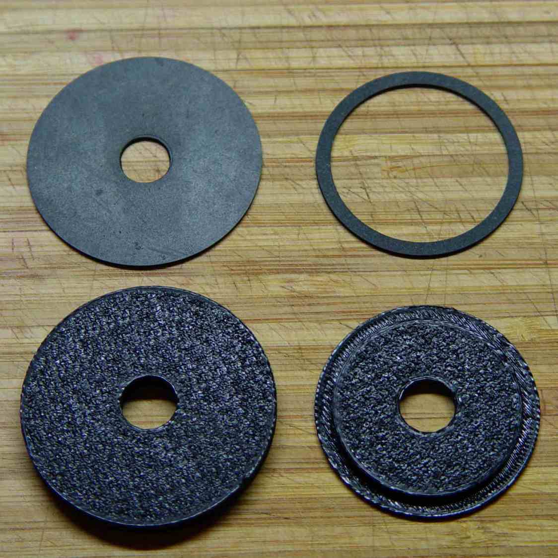 Kitchen faucet - plastic disks and rubber deck washers