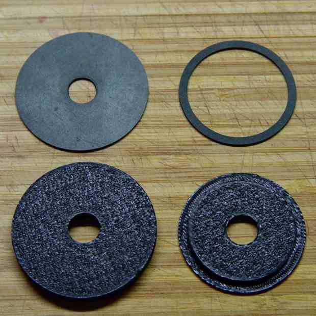 Kitchen faucet - plastic disks and rubber deck washers