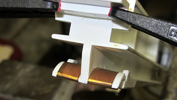 Refrigerator strut - phosphor bronze covers - top