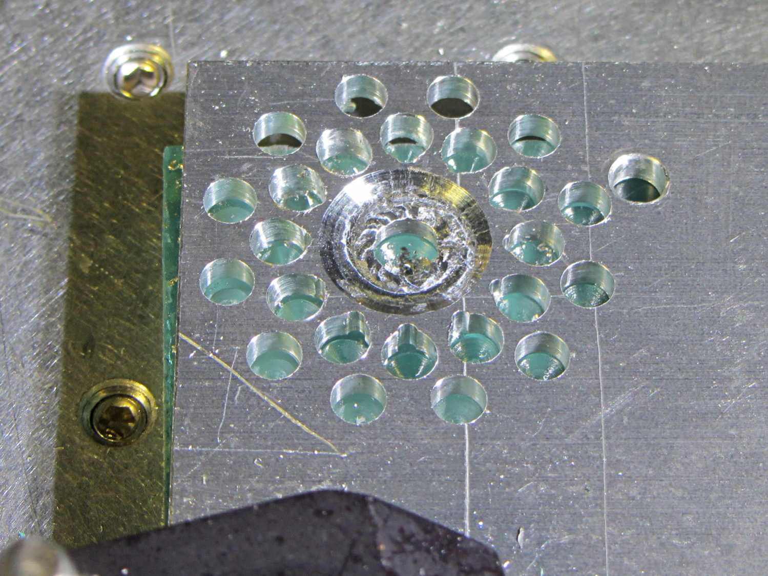 Can opener gear - first hole pattern